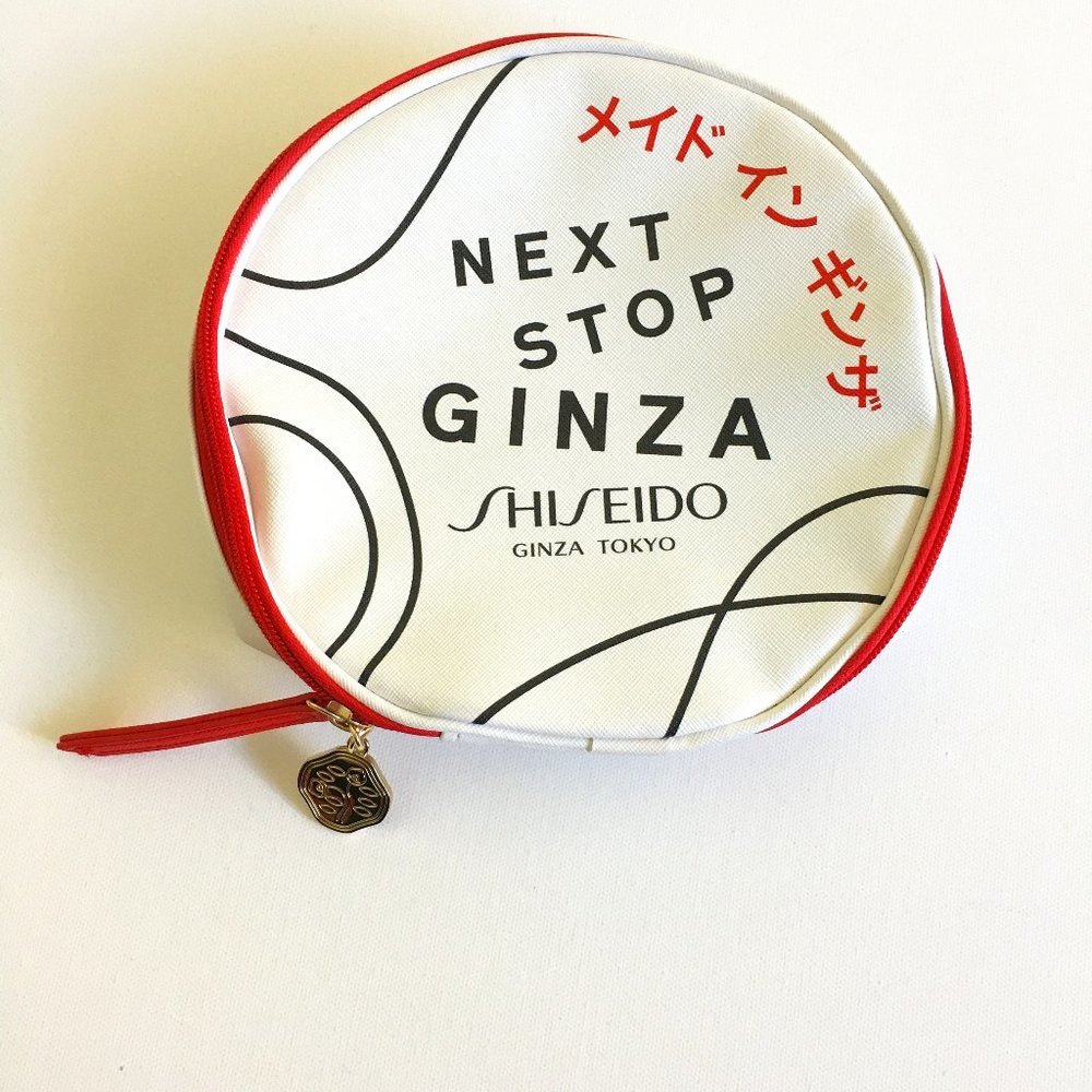 Shiseido Ginza Tokyo New Round Cometic Bag White Coated Vinyl 7.25" diameter x3"